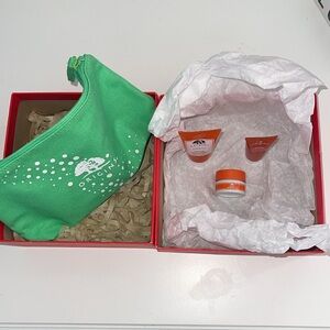 Origins cosmetic bag with Ginzing mini scrub eye/gel cream NWOT